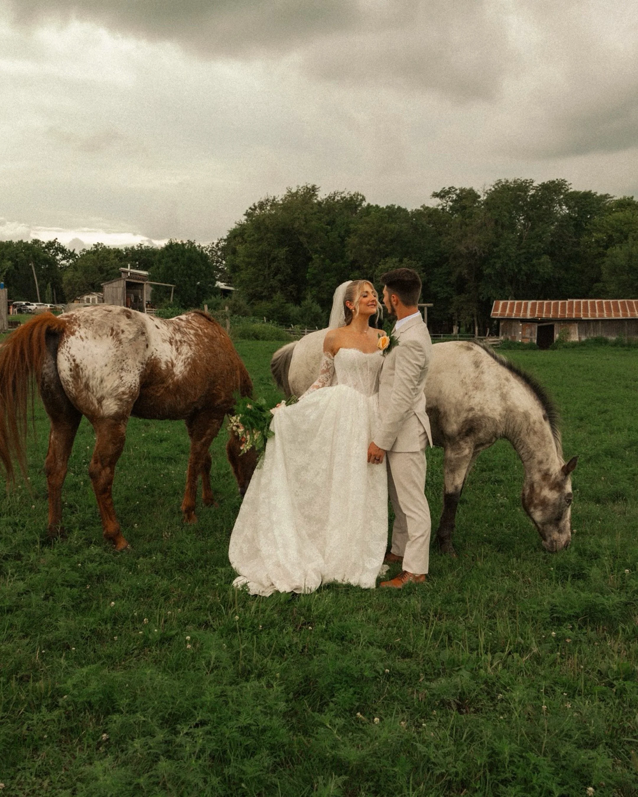 The Bosco&rsquo;s🤍✨

A dark and moody sky with these two unexpected guests made this day truly magical✨

Photo: @dawn_macphoto 
Makeup: @skinbydy|ll
Dress: @rhylanlangbridal
Rings: @bluenilediamond
Florals: @janousekfloristinc
Cake: @omahacakegaller