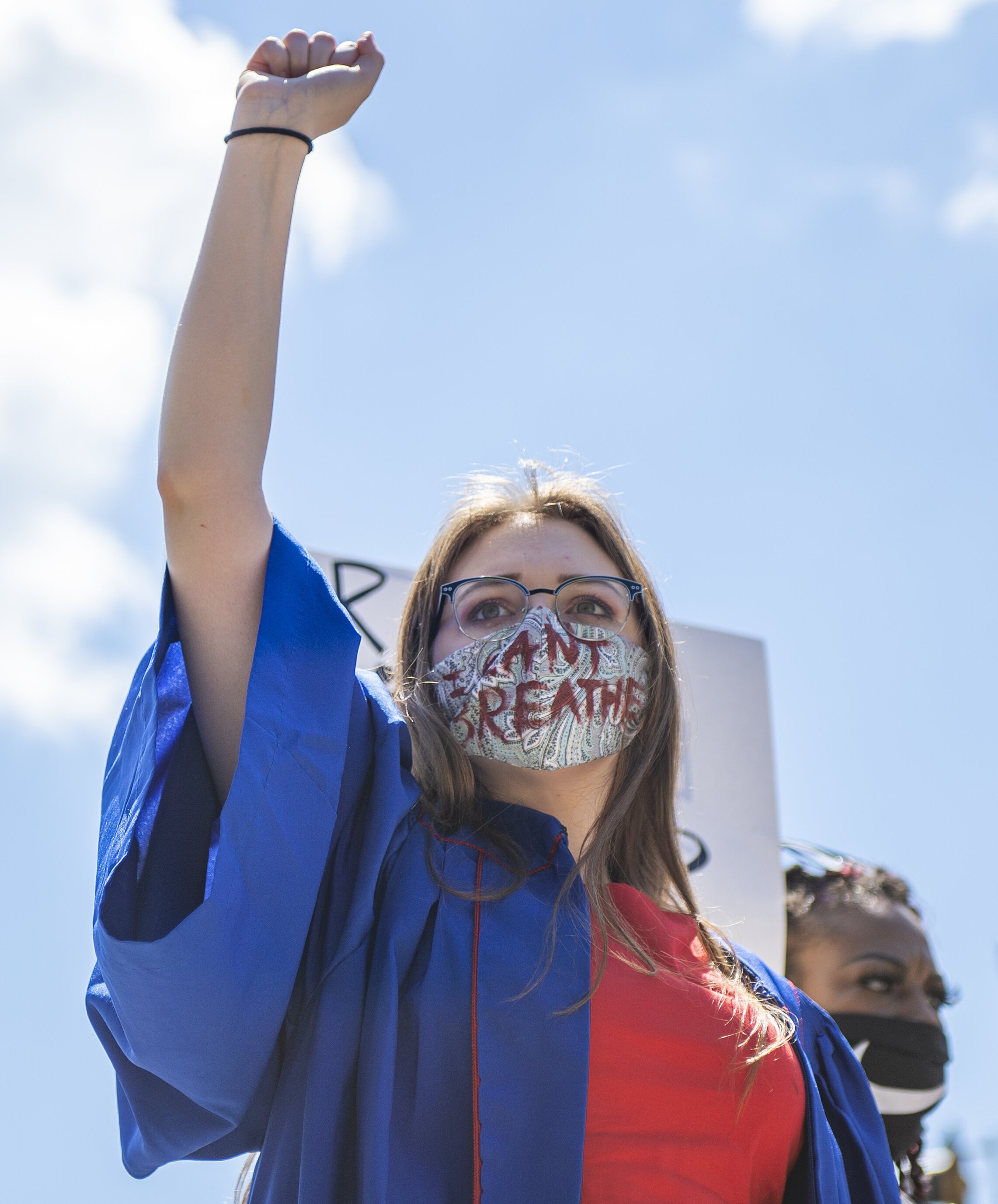 After attending her graduation ceremony from Riverside High School, Hannah Kegley joins in the George Floyd protest on Saturday afternoon.