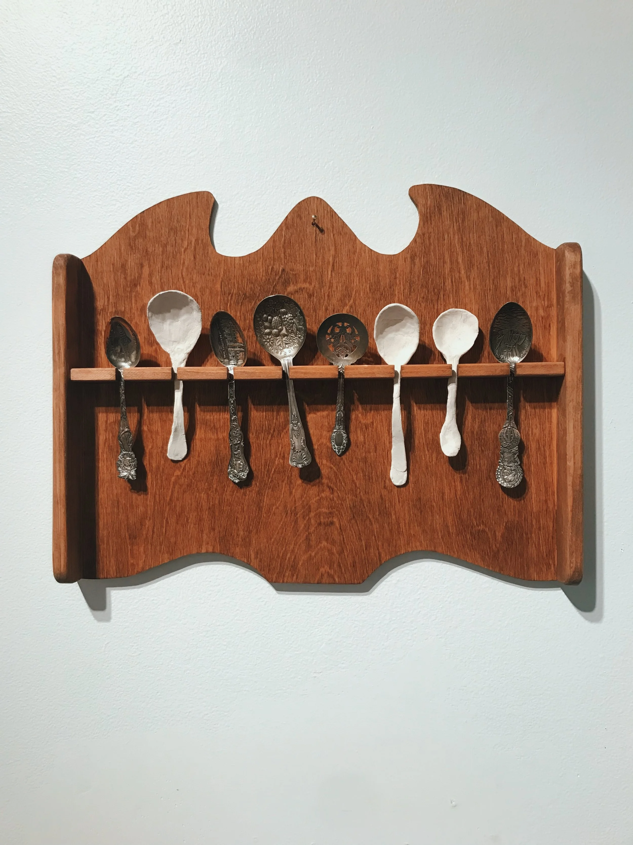 "Souvenir Spoons", 2017, wood, paper clay, kept objects