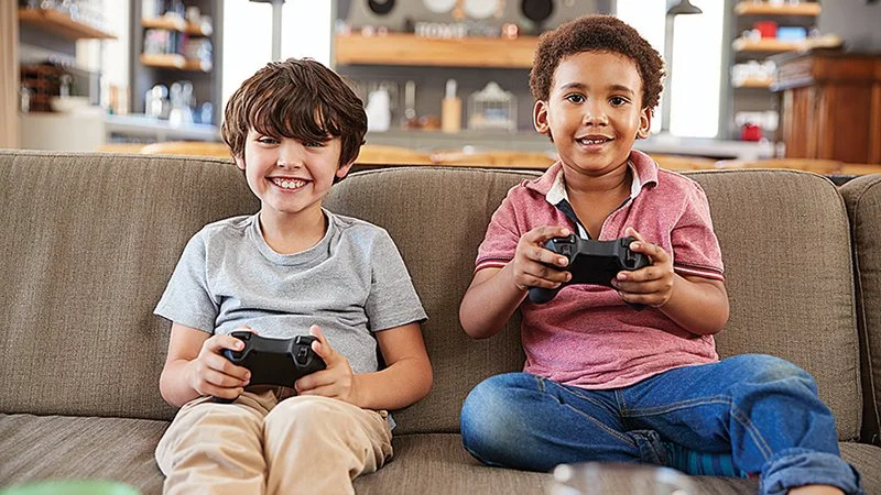 What are the benefits and negative impacts kids receive from playing video games?