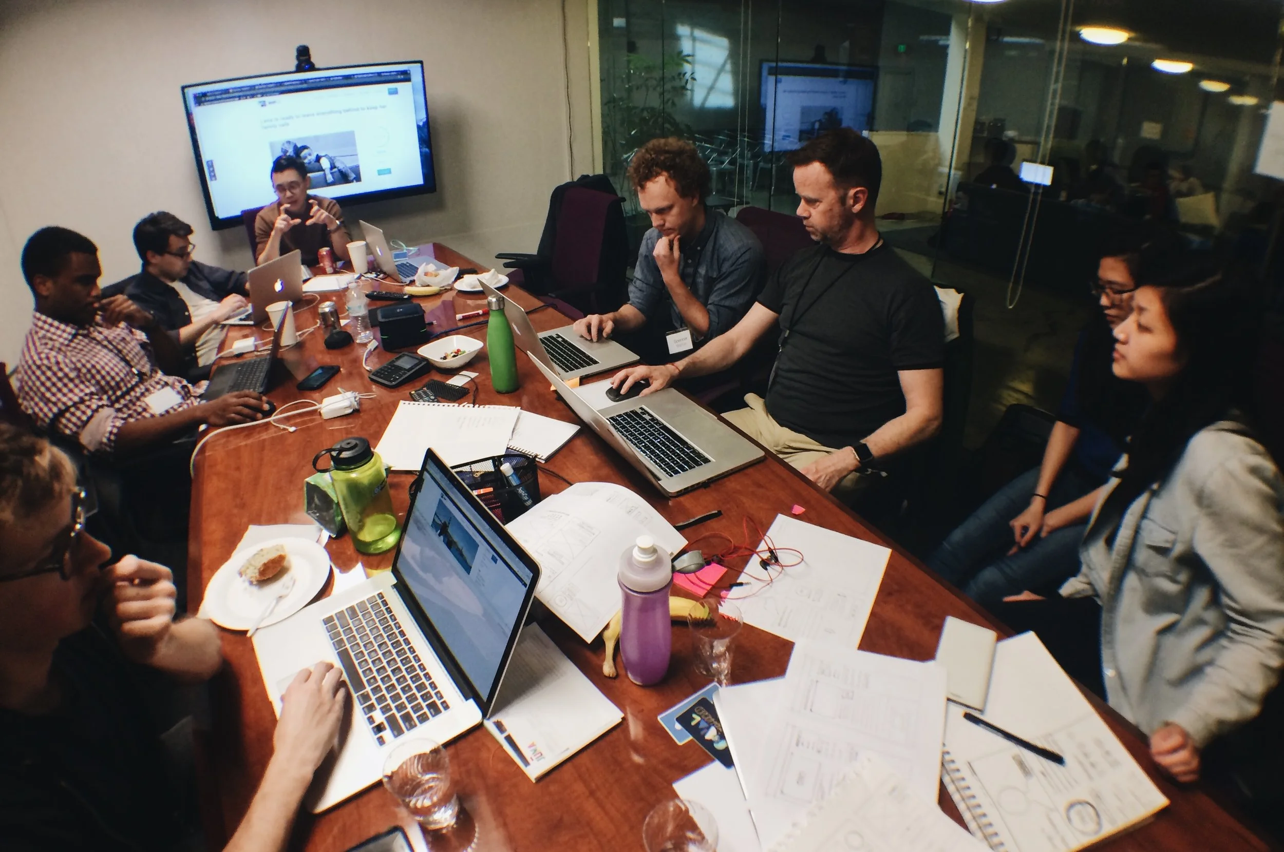 Hackathons are a mess of post-its, papers, charging cords, and snacks. Lots of snacks.