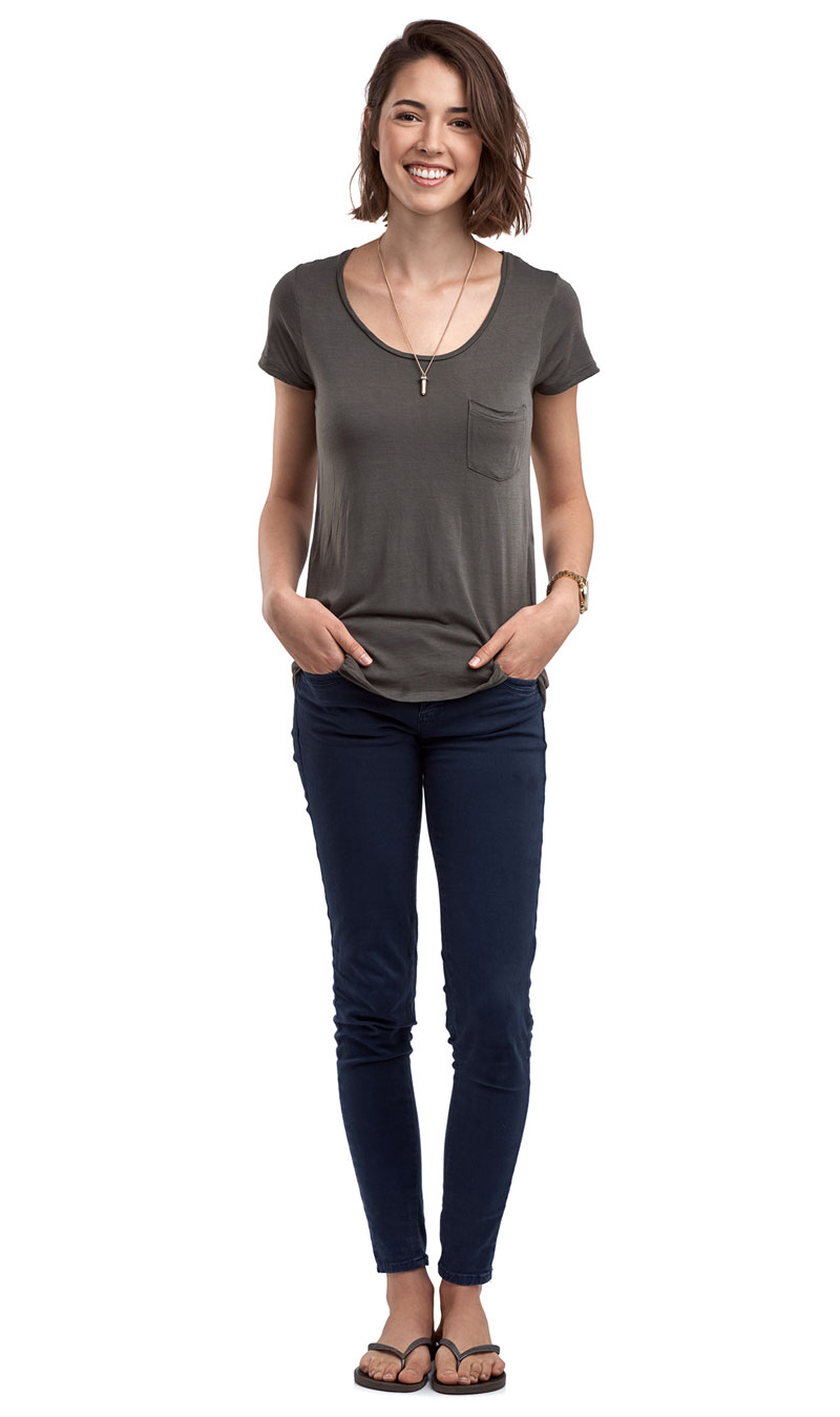 Amy standing with hands in pockets