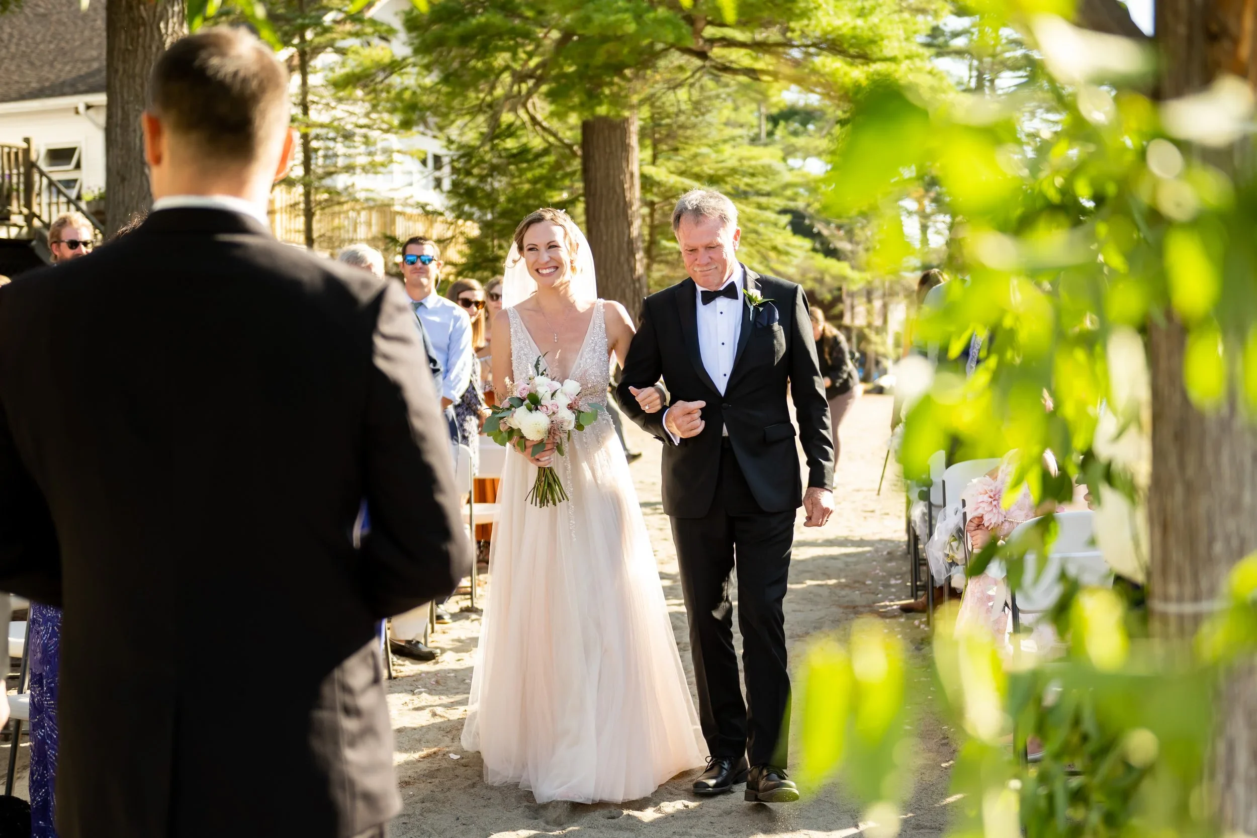 RobSpring_ChristinaLucas2022_BrideEntrance_V.webp