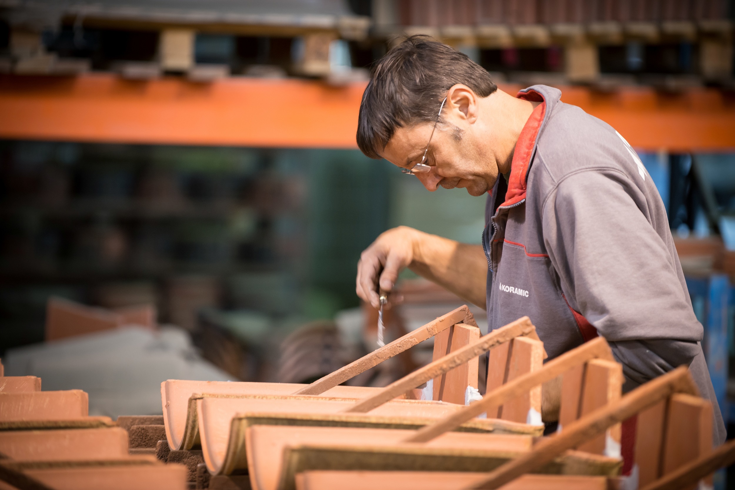 Manual production of accessory roof tiles (Uwe Strasser for Wienerberger AG)