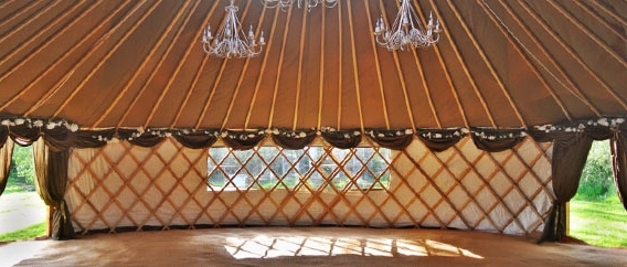 The sunlight streams into a yurt, creating a beautiful, natural and calming space.