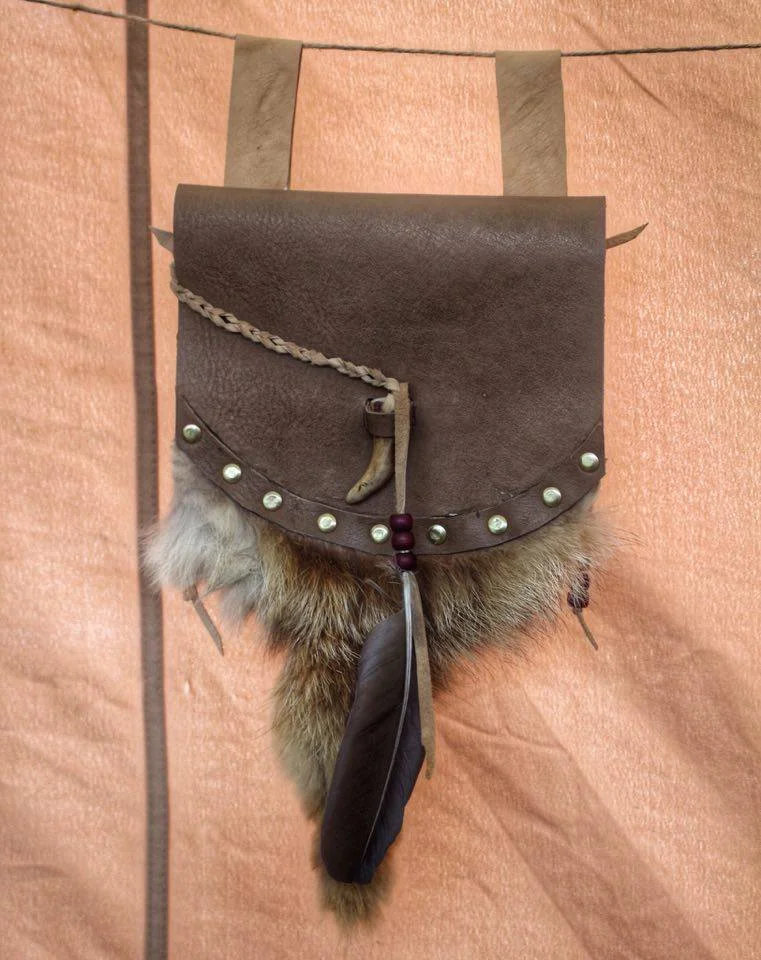 Brown Leather Purse with Antler Toggle, Fur and feathers £40 Contact Us For Prices