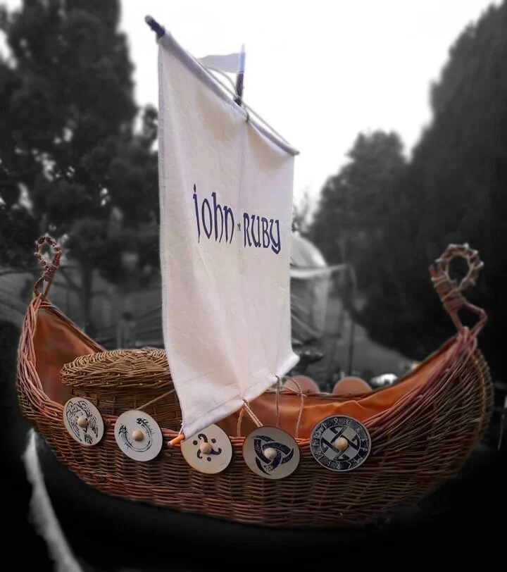 viking+ship+casket+with+bespoke+wooden+shields.jpg