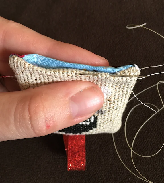 How to make cross stitch Christmas ornaments