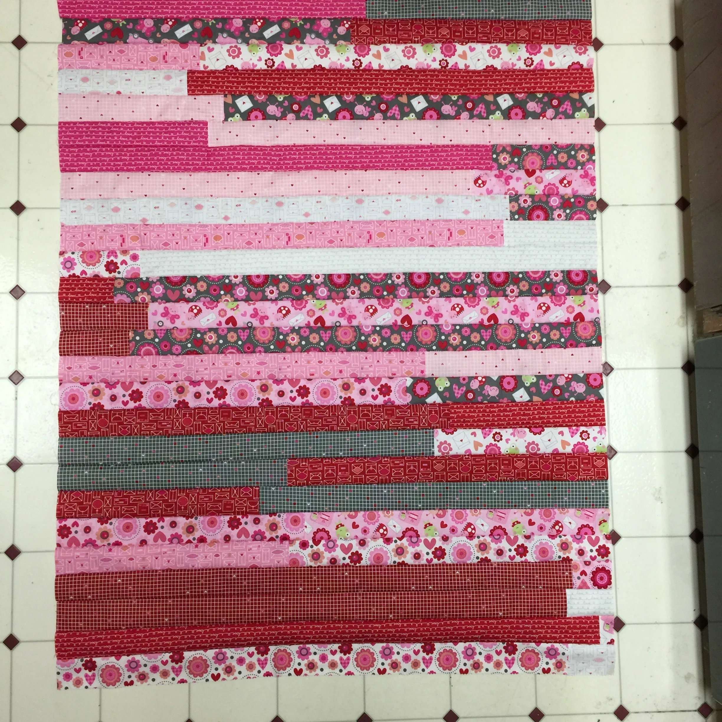 Jelly Roll Baby Quilt Tutorial: Jelly Roll quilt top completed