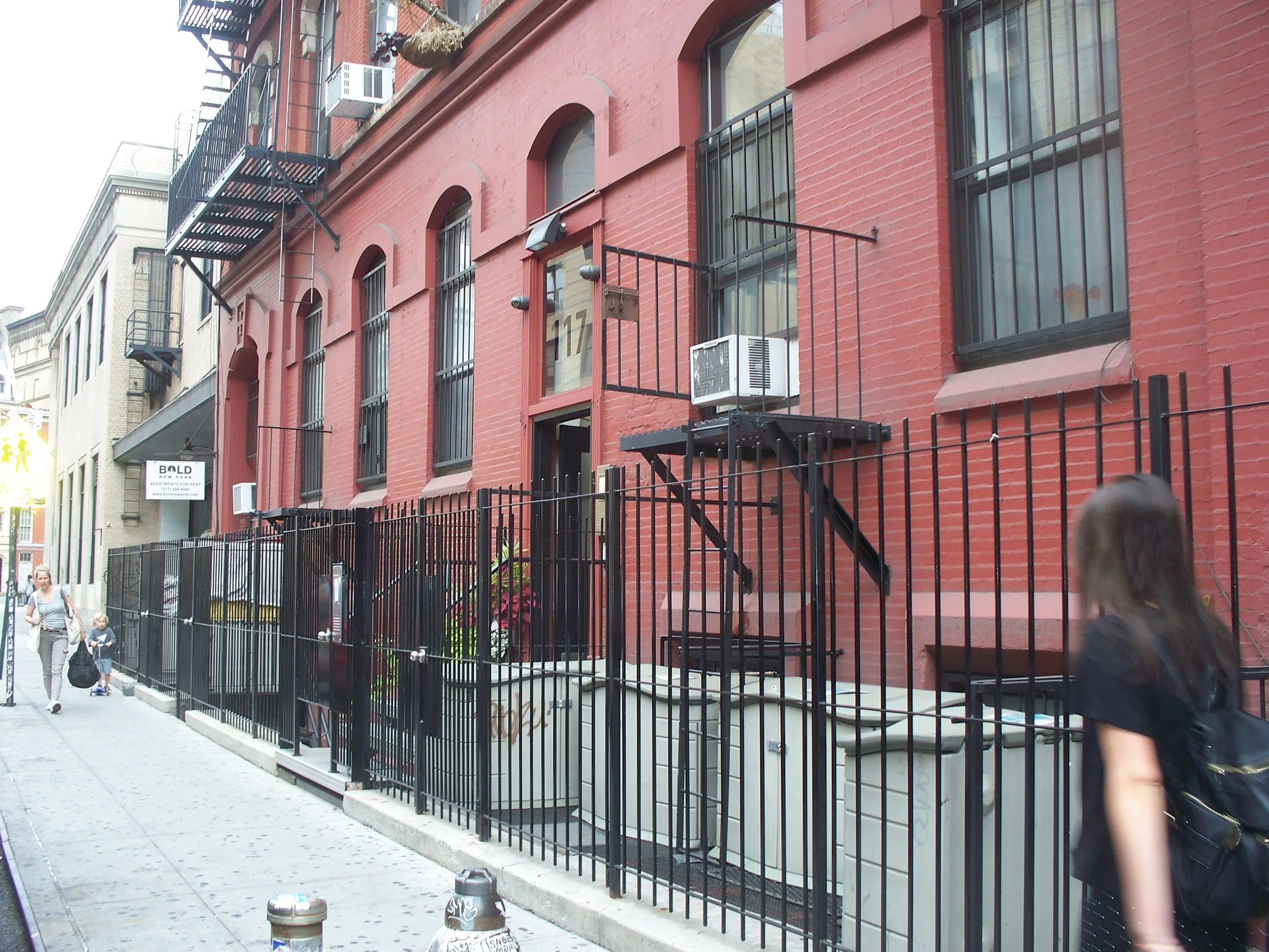117 East 11th Street Front area way - garbage bins - After renovation