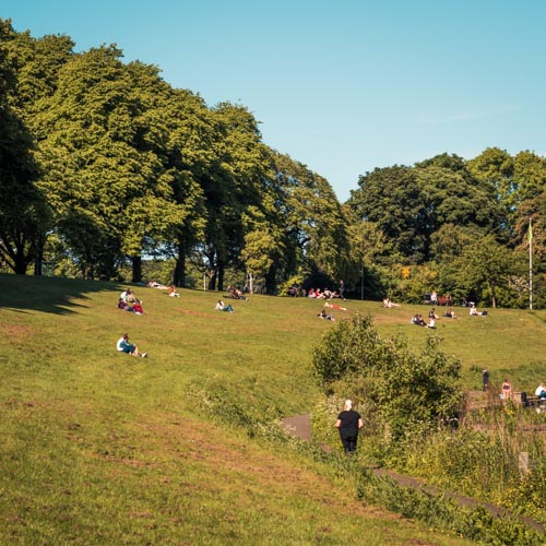 Sunbathing in Inverleith Park. Copyright Martin C Stewart