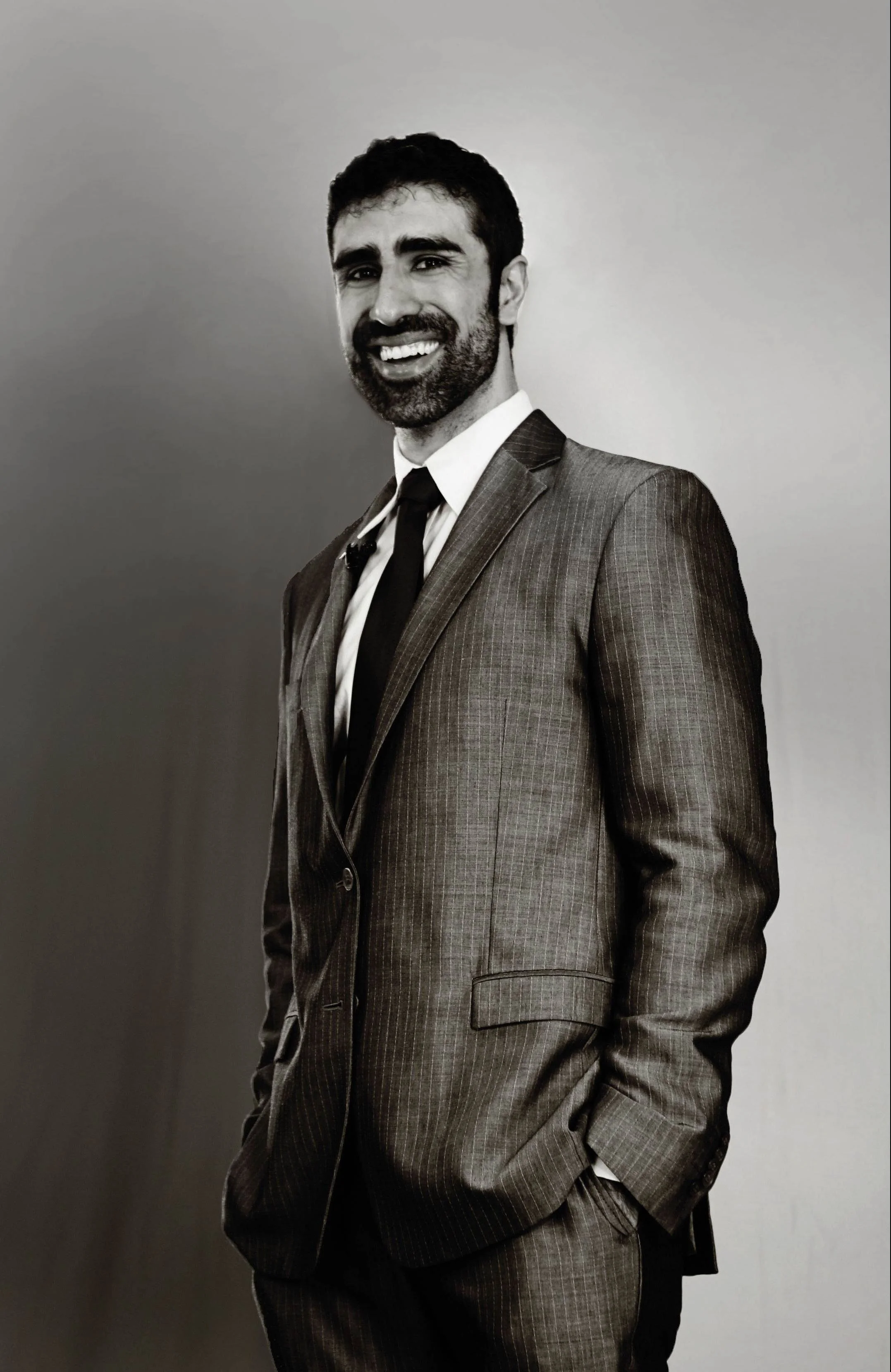 _Arvin Vohra Headshot BW gold copy 2 Left Facing.jpg