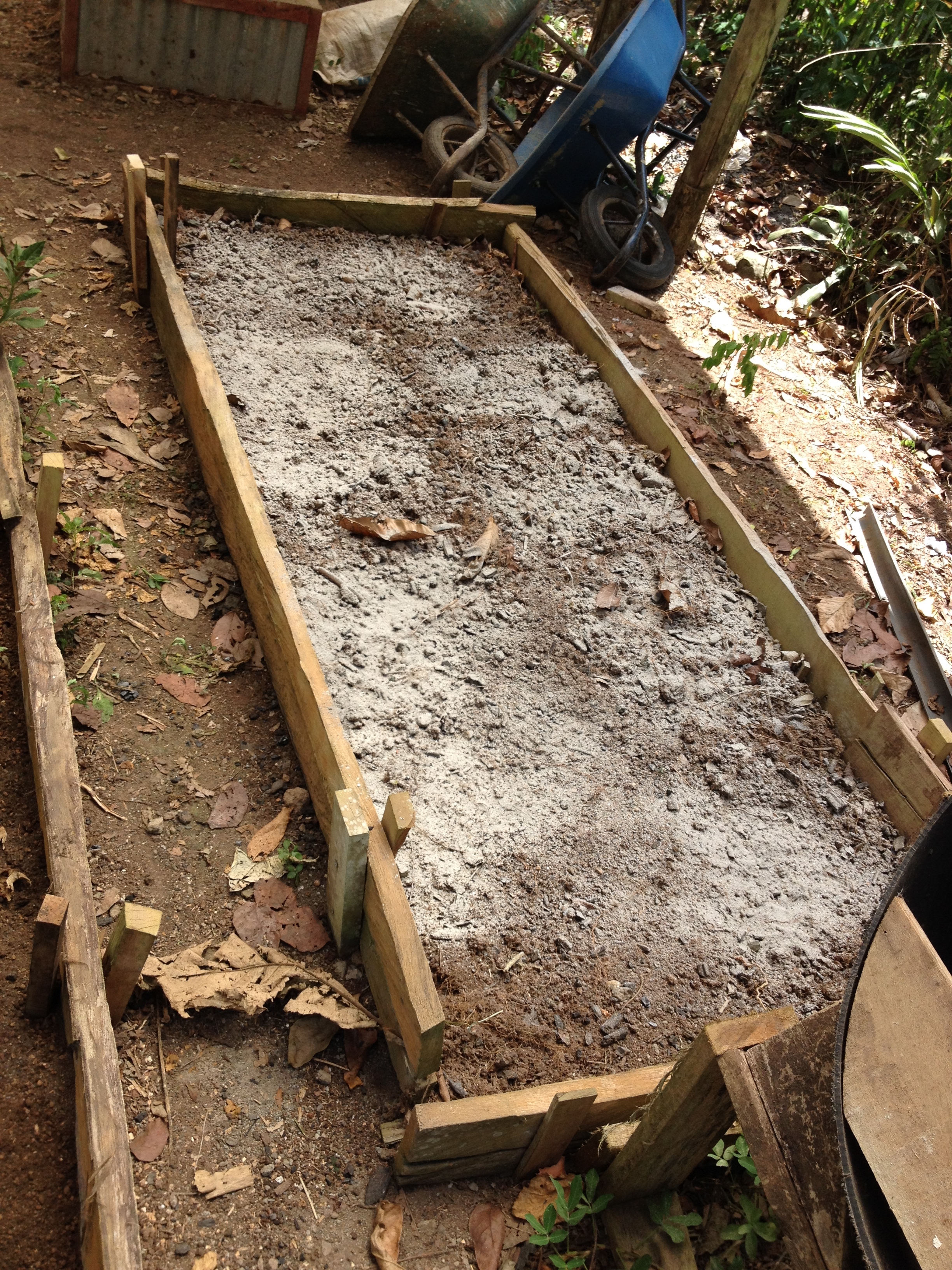 Lime applied to a raised garden bed.