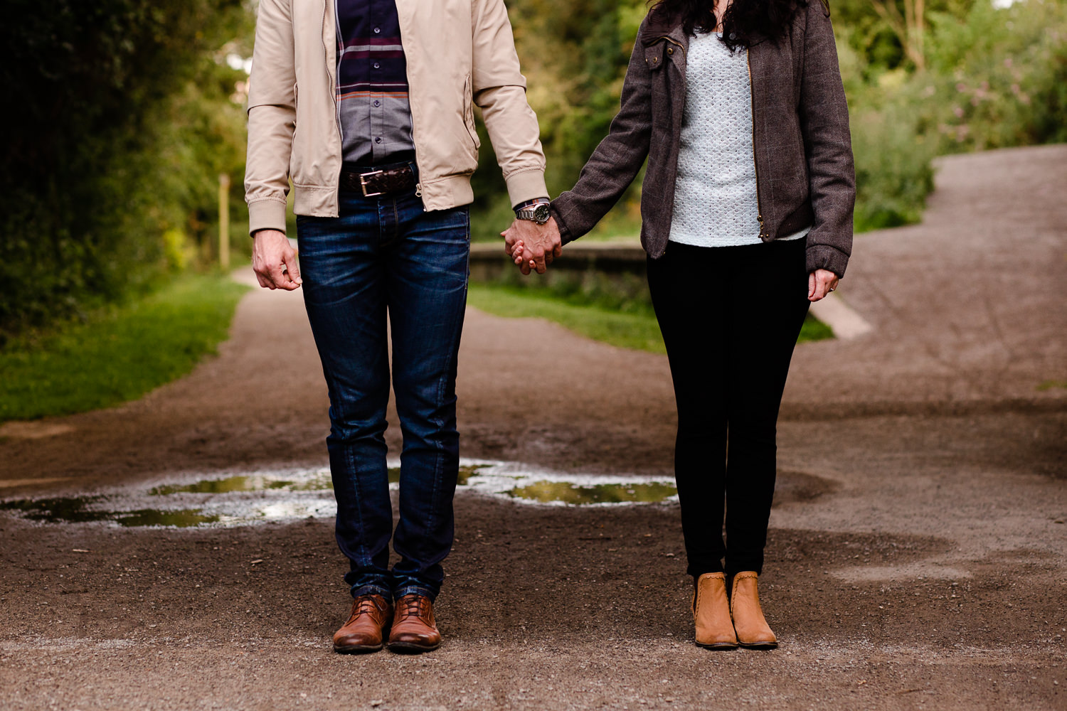 A couple holding hands standing side by side - Wirral Country Park, Merseyside, couples shoot