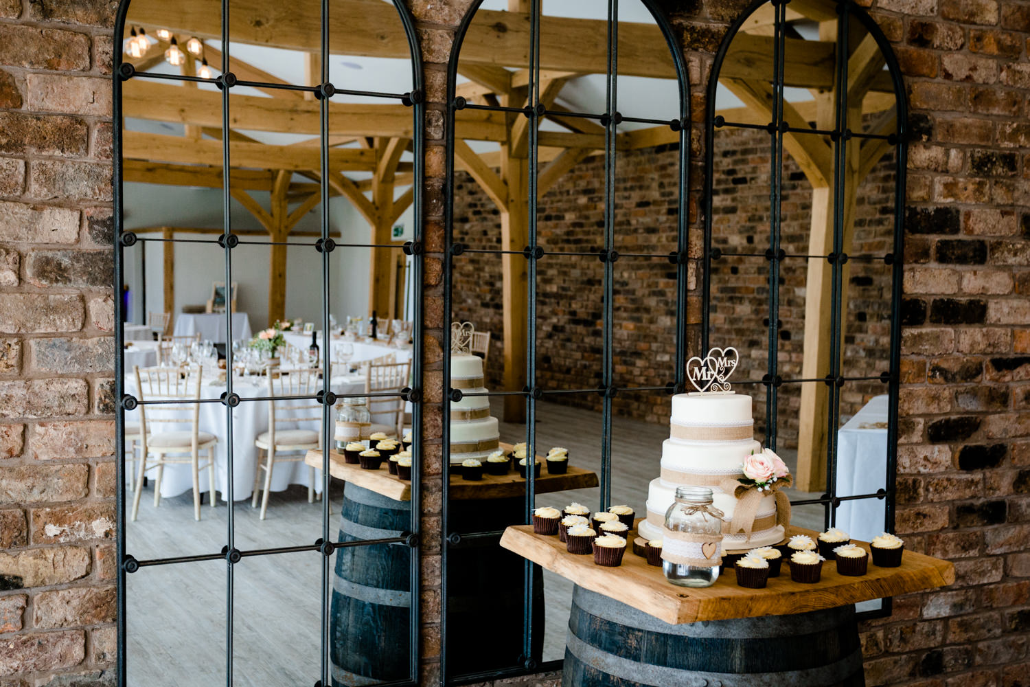Mirrored wall and wedding cake at Pryor Hayes venue, Cheshire