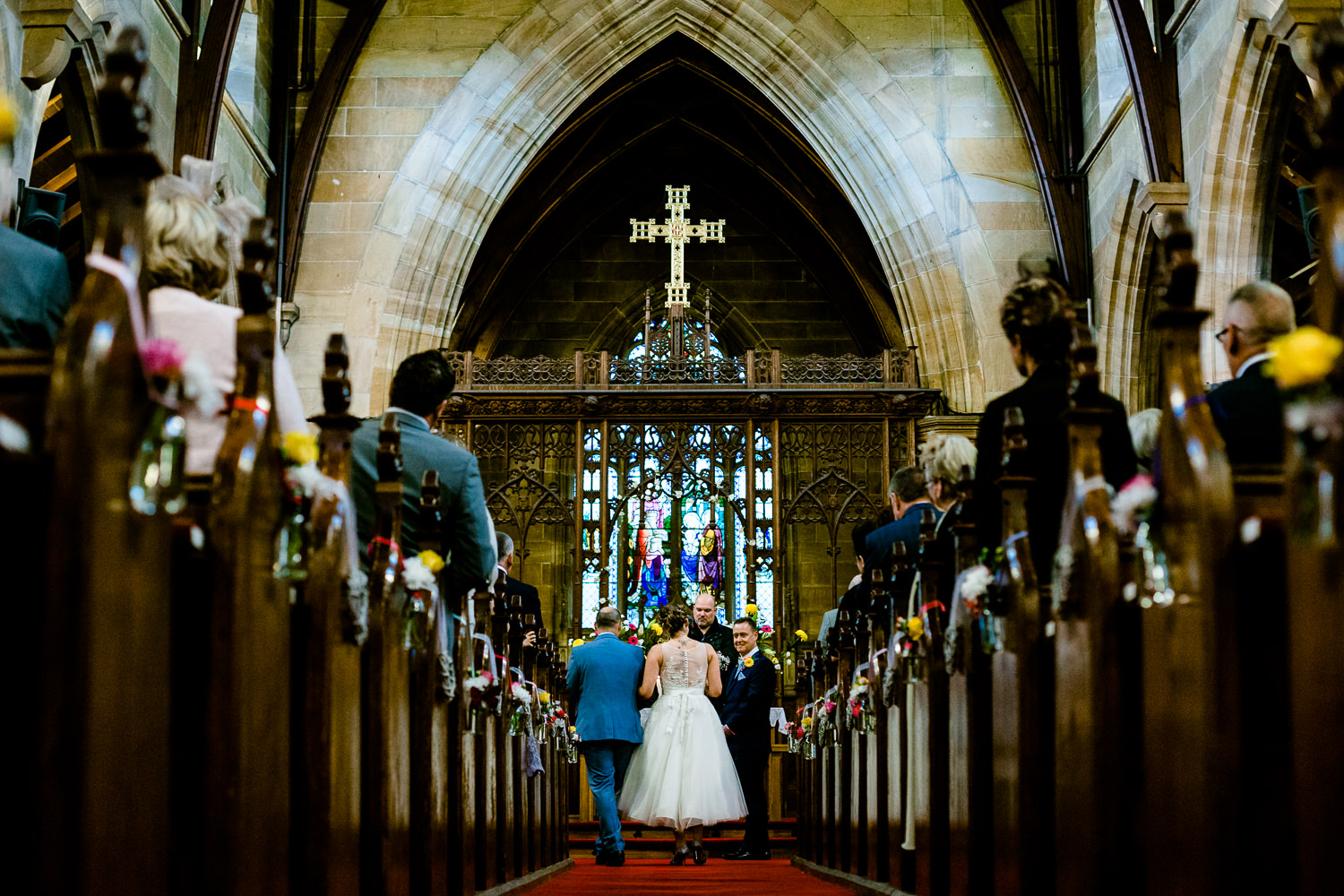 Christ Church Bebington in Wirral wedding, a view down the isle of a wedding. 