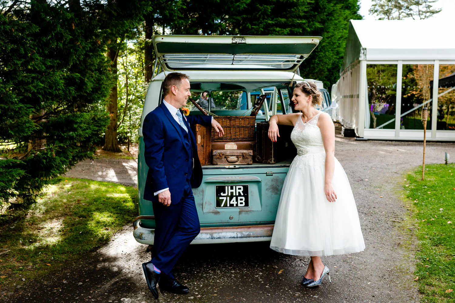Kat &amp; Ray and a vintage VW campervan at Thornton Manor Wirral on their wedding day.