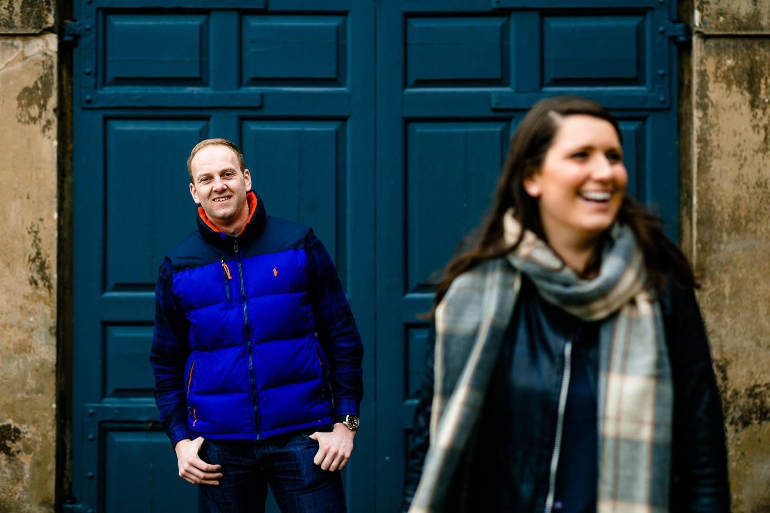 Claire and Damien laughing on their relaxed pre wedding shoot. 