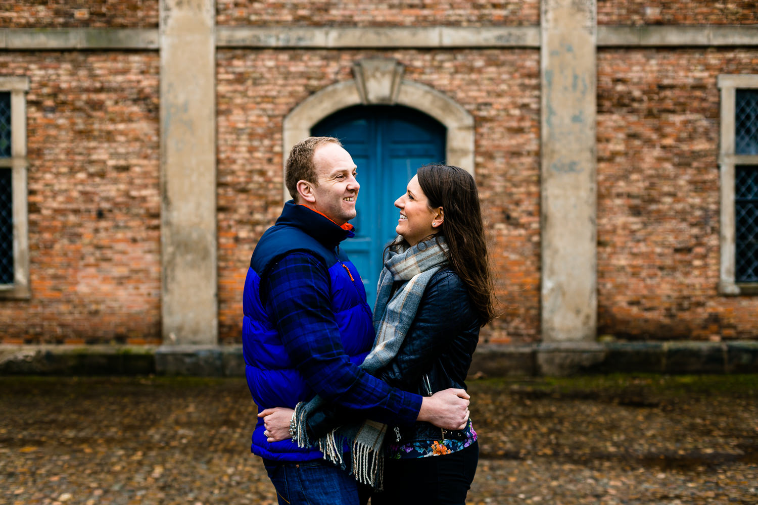 A couple facing each other on their pre wedding shoot. 