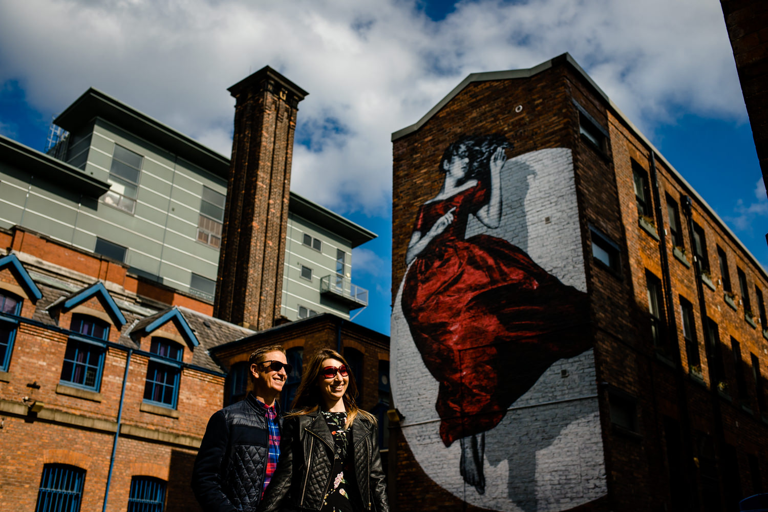 Cool couple on a sunny urban pre wedding shoot in the Northern Quarter, by Manchester wedding photographer.