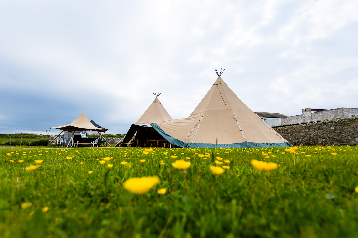 Wedding Tipi in a field for a relaxed festival wedding in Anglesey, Wales wedding photographer