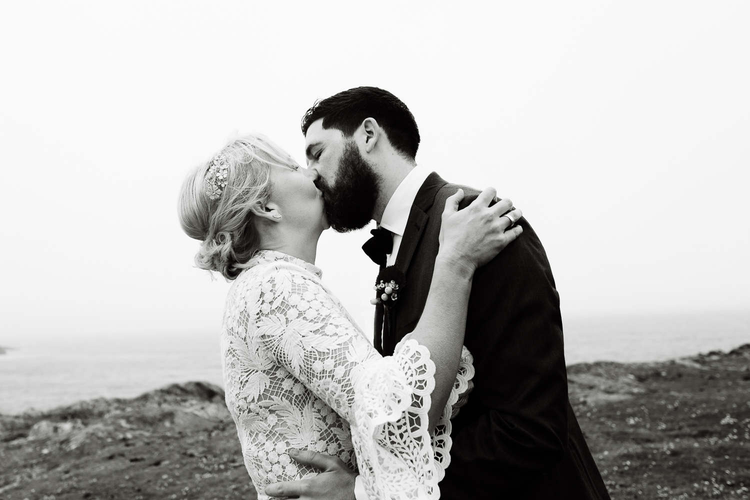 A bride and grooms first kiss, Wales wedding photography. 