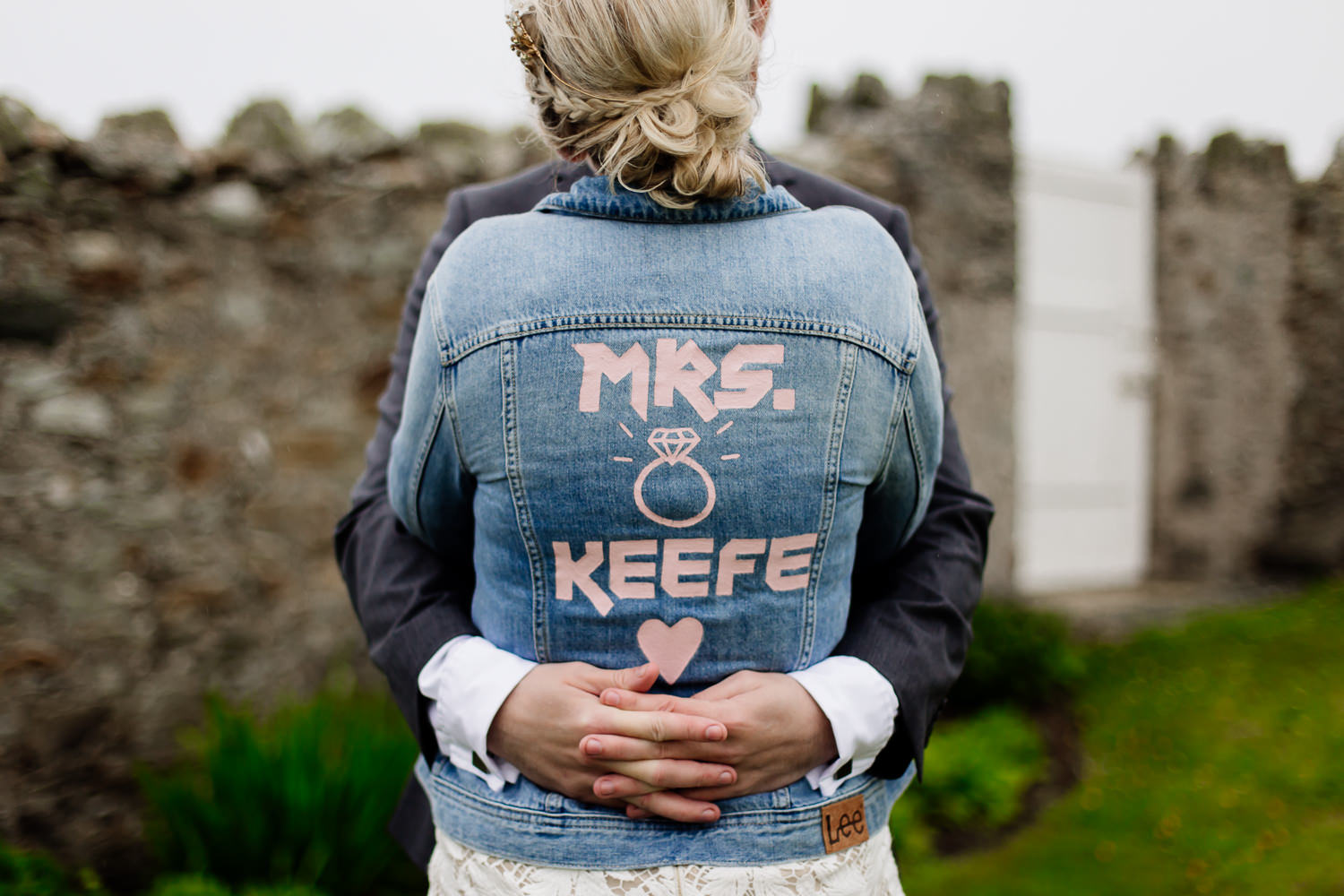 Bespoke wedding denim jacket with painted writing on the back. 