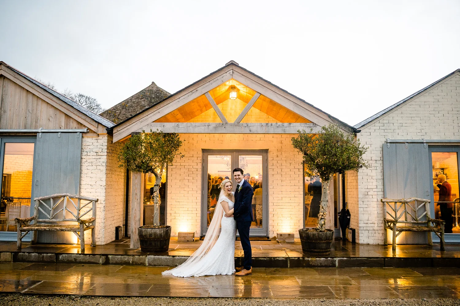 A bride and groom outside Eden Barn, Wedding Photography