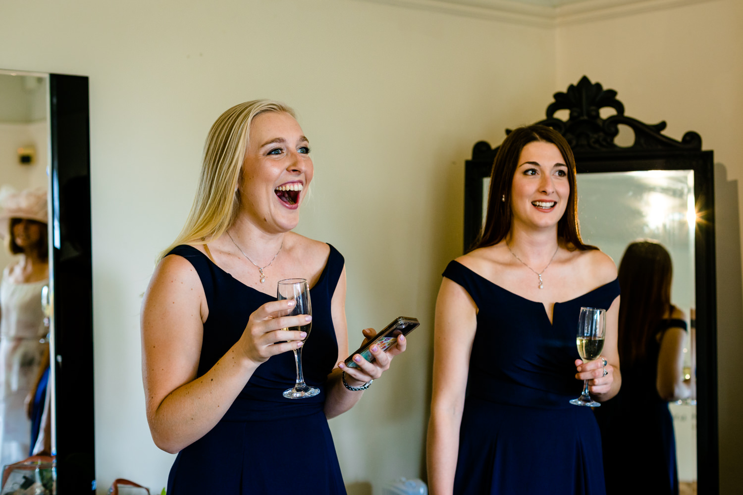 Laughing bridesmaids, relaxed Whirlowbrook Hall photography