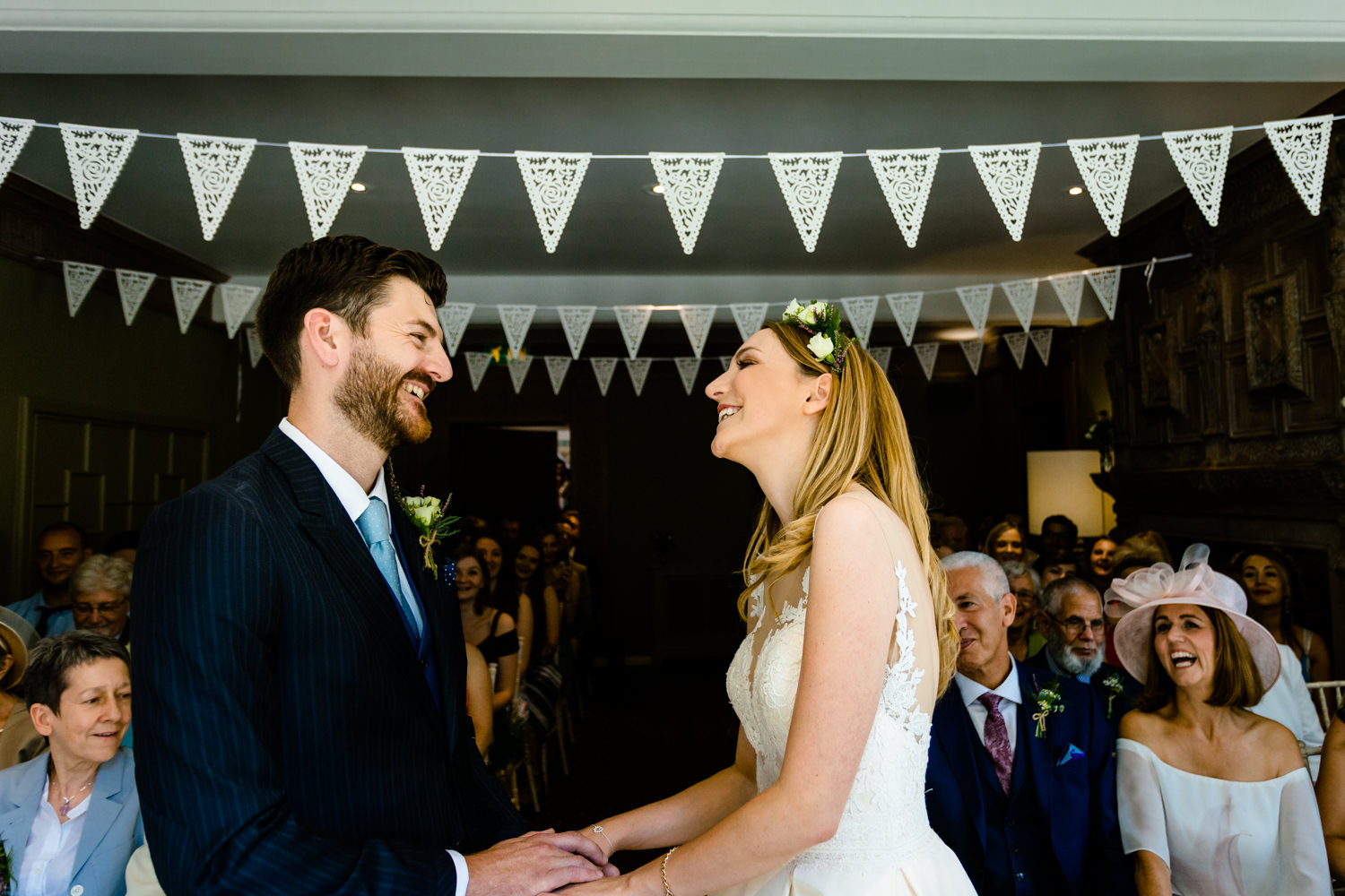 A bride and groom say I do,  Colourful Whirlowbrook Hall	photos