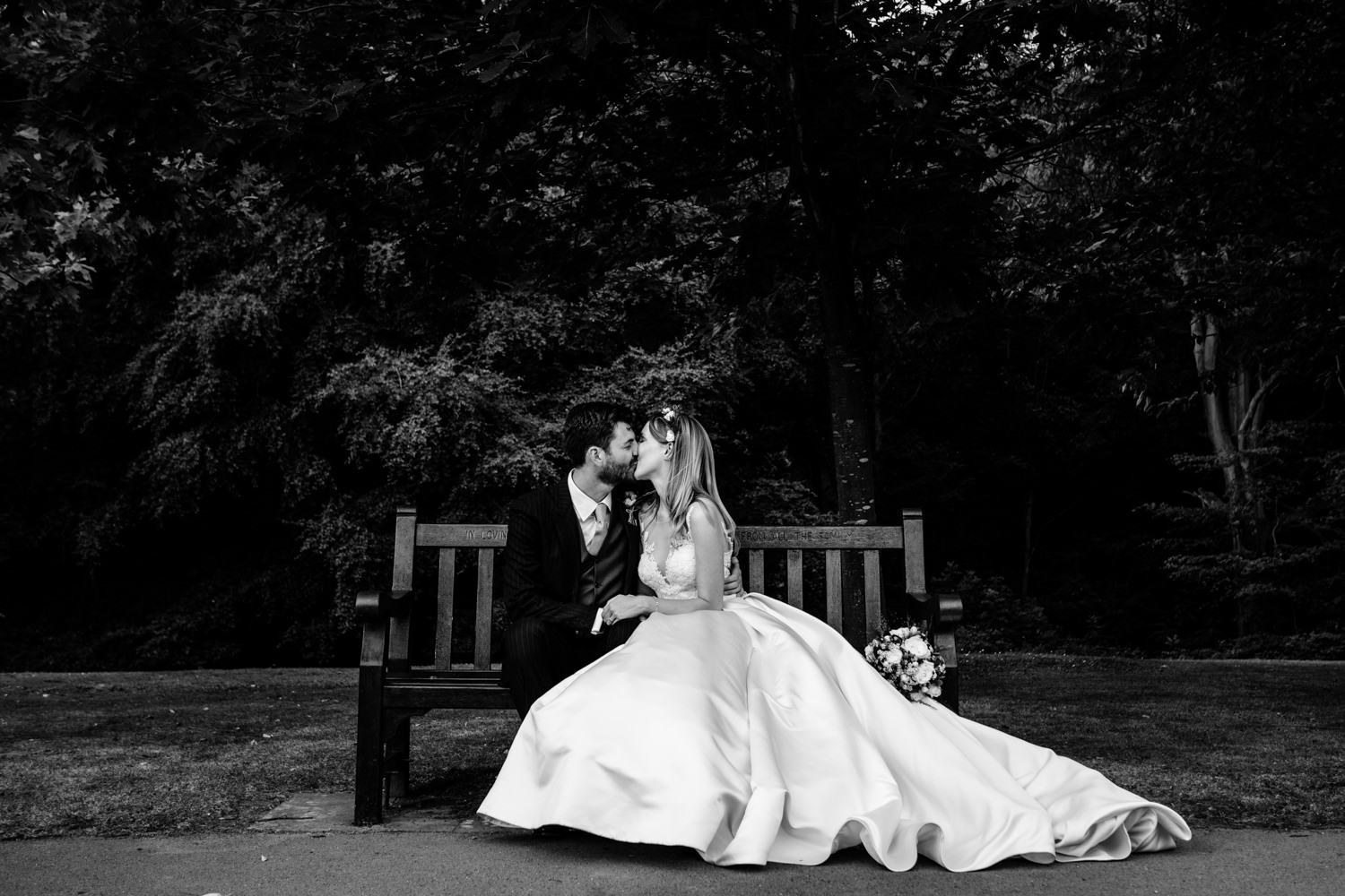 Romantic kiss between a bride and groom, wedding	photographer Whirlowbrook Hall Sheffield