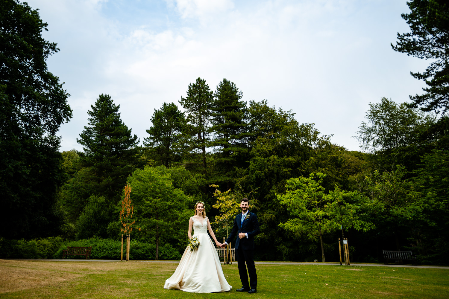 Bride and groom stood in the garden, Colourful Whirlowbrook Hall photographer