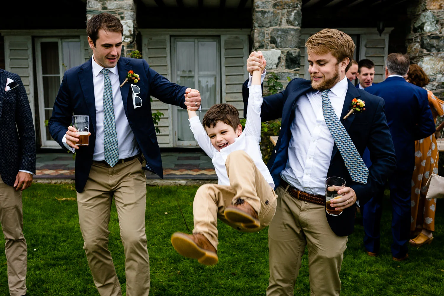 Guests having fun at a tipi wedding relaxed Anglesey wedding photographs