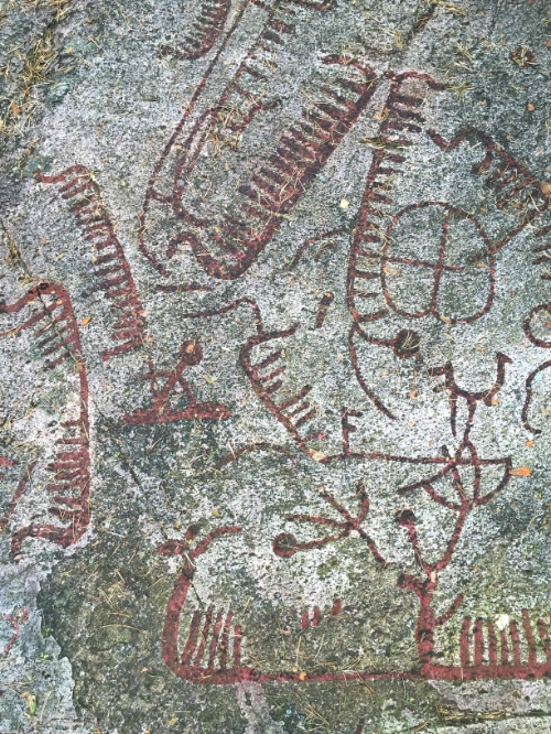 Boats (voyaging to the underworld) the 'soles' of a gods feet (top right)
