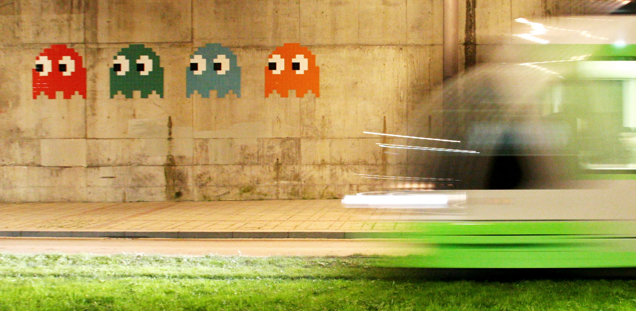 Space Invader's Pac-Man mosaics BBO 24–27 (from left) in Bilbao near the Guggenheim Museum.