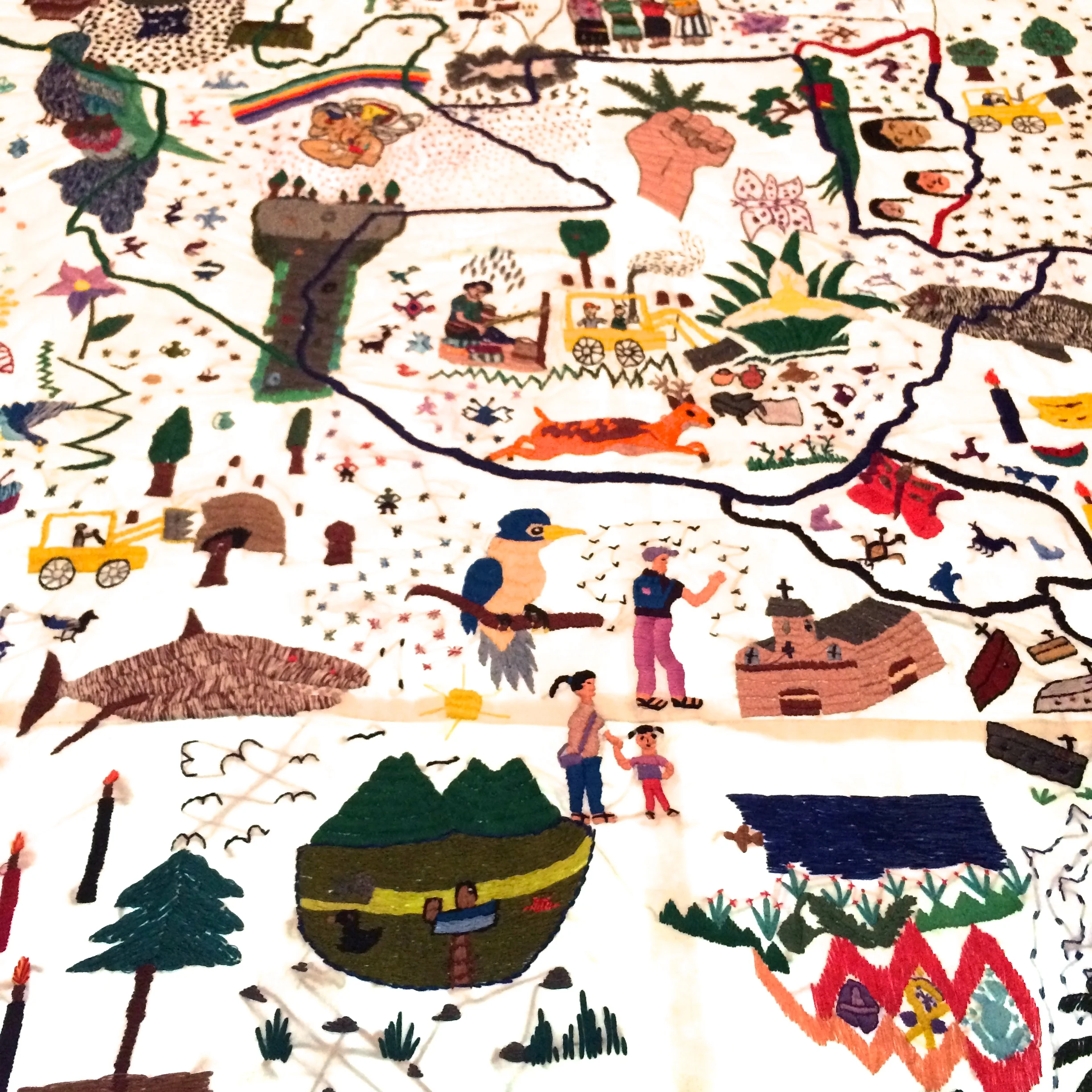 A closely cropped detail of Teresa Margolles, Nkijak b'ey Pa jun utz laj K'aslemal / Opening Paths to Social Justice , 2015. Embroidery on fabric permeated with blood from the body of a woman assassinated in Guatemala City. Created with participation of Mayan women members of the Asociación de Desarrollo de la Mujer K'ak'a Na (ADEMKAN): Bonifacia Cocom, Lucy López, Yuri López, Silvia Menchù, Claudia Nimacachi, Lucrecia Puac, Estela Tax, and Josefina Tuy. 78 3/4 x 18 3/4 in. 