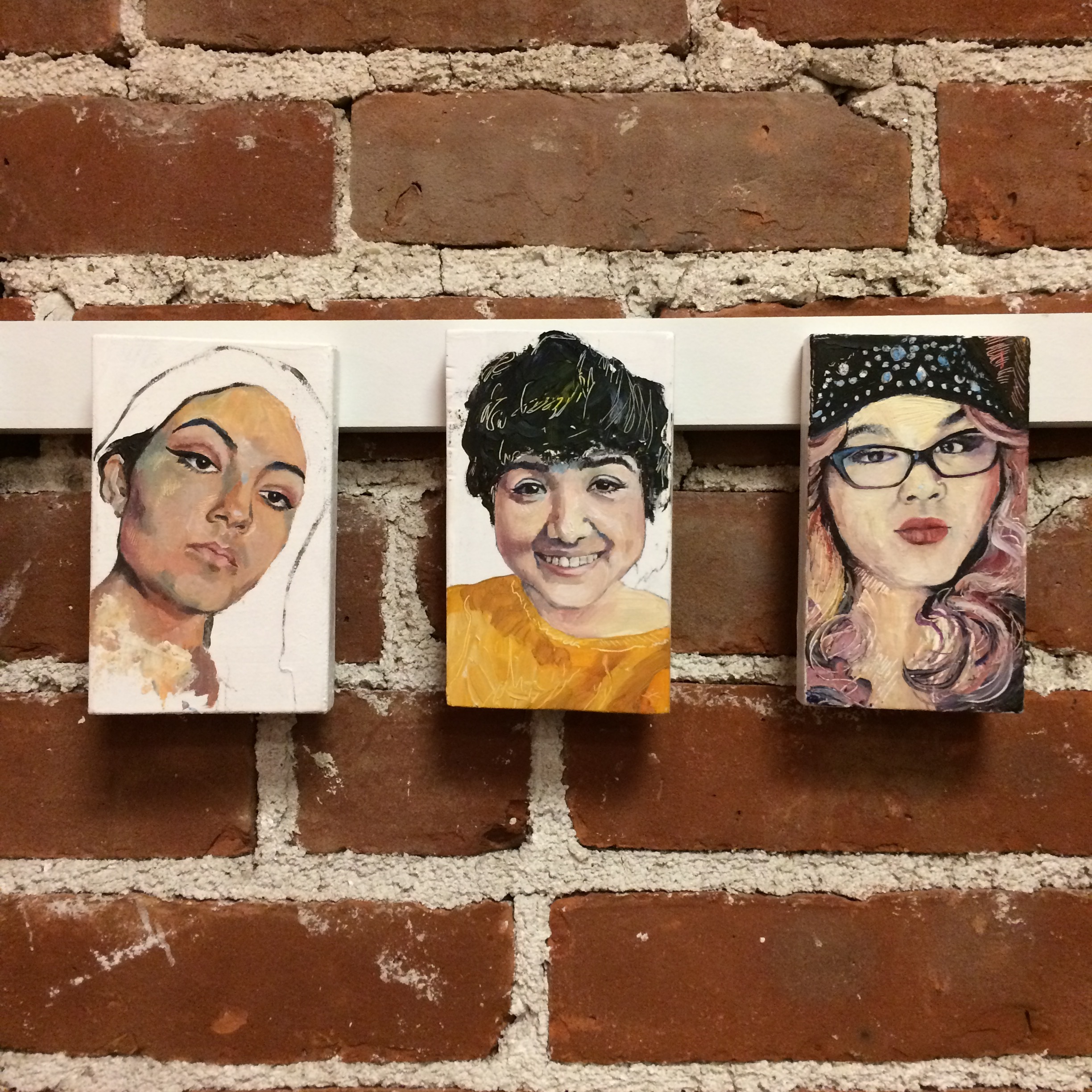 A trio of portraits from the series #Latina: Reclaiming the Latina Tag , on view at the Arlington Art Lounge . View more examples from the series here . 