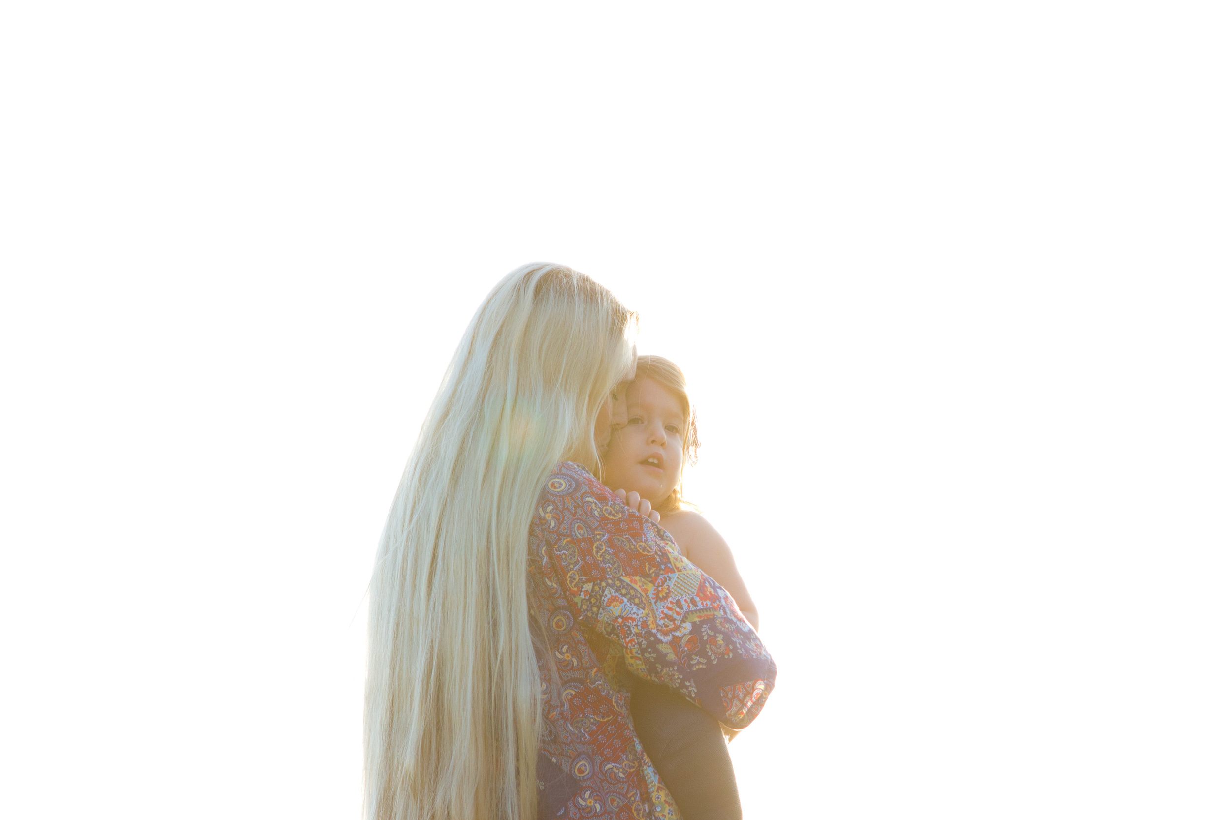 Mother and child kiss