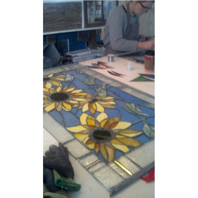  Working in the studio on this custom sunflower panel which will be hung outside on a this clients porch. 