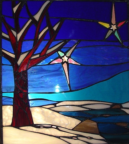  "Winter Warmth"  Stained Glass  Created for a wedding present for a couple in Jackson Hole, WY. There are two editions of this panel. The other belongs to a couple in Haddonfield, NJ.  Designing and fabrication typically are all done in our studio l
