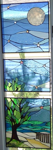  "Beach Entrance, Full Moon"  Stained glass  My clients wanted to depict the beach entrance at the end of their street. At the time of the commission, I had an incredible photo by Ann Coen hanging in my gallery featuring surfers in the water with a g