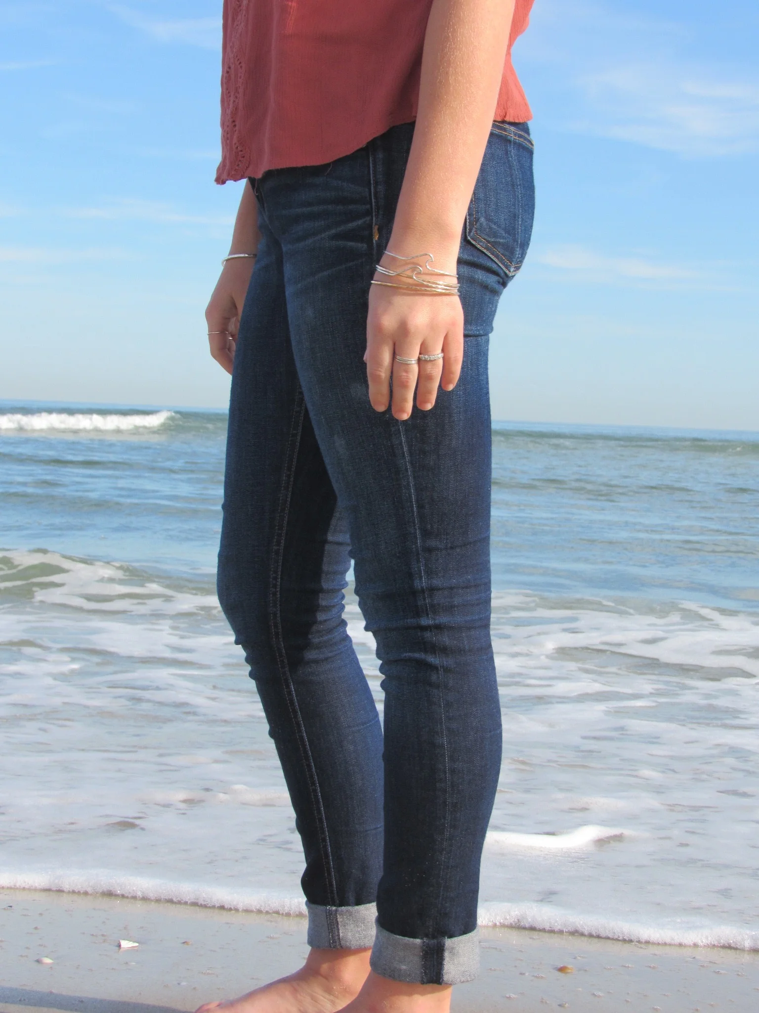 model posing with wave bangle