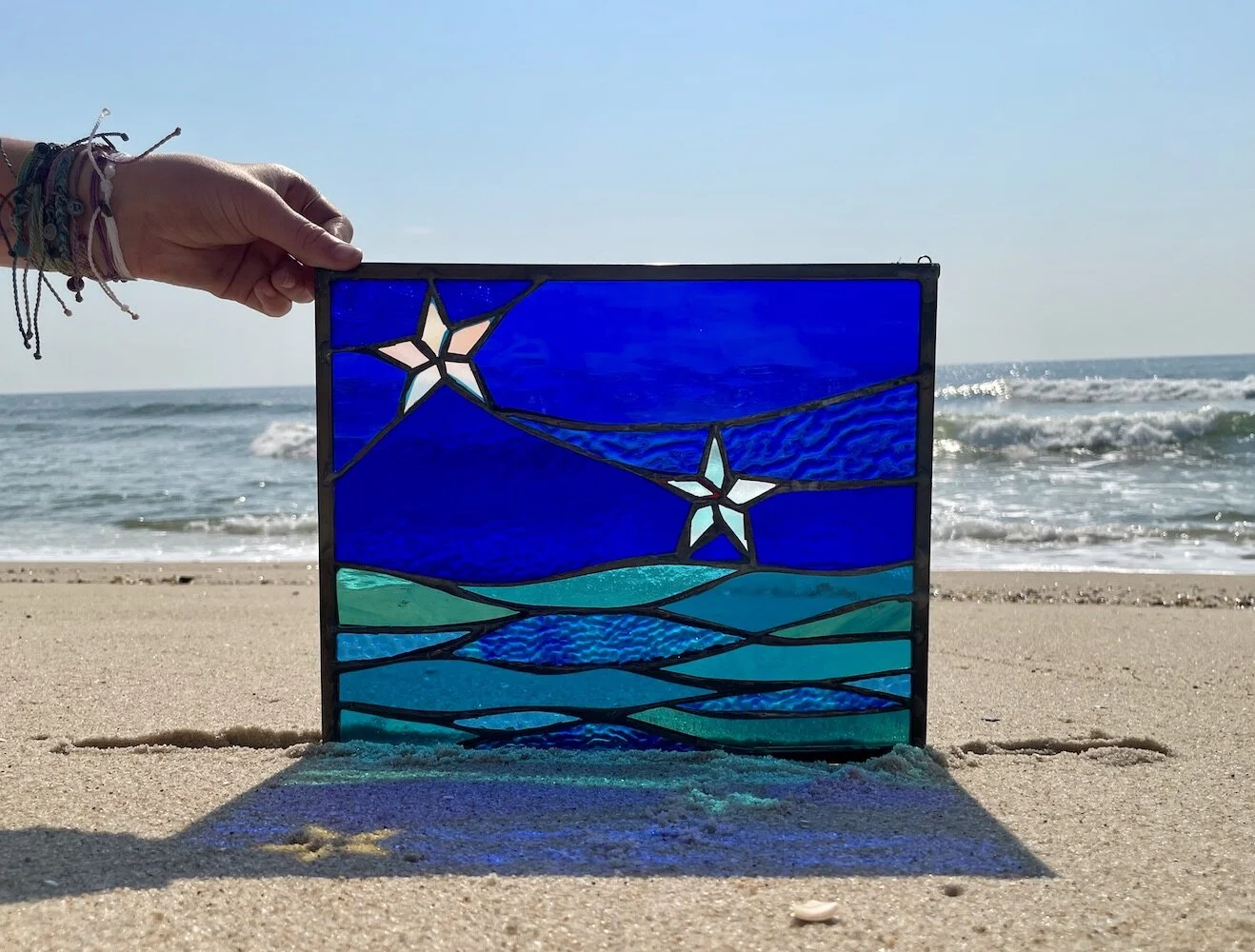 two stars over the sea stained glass