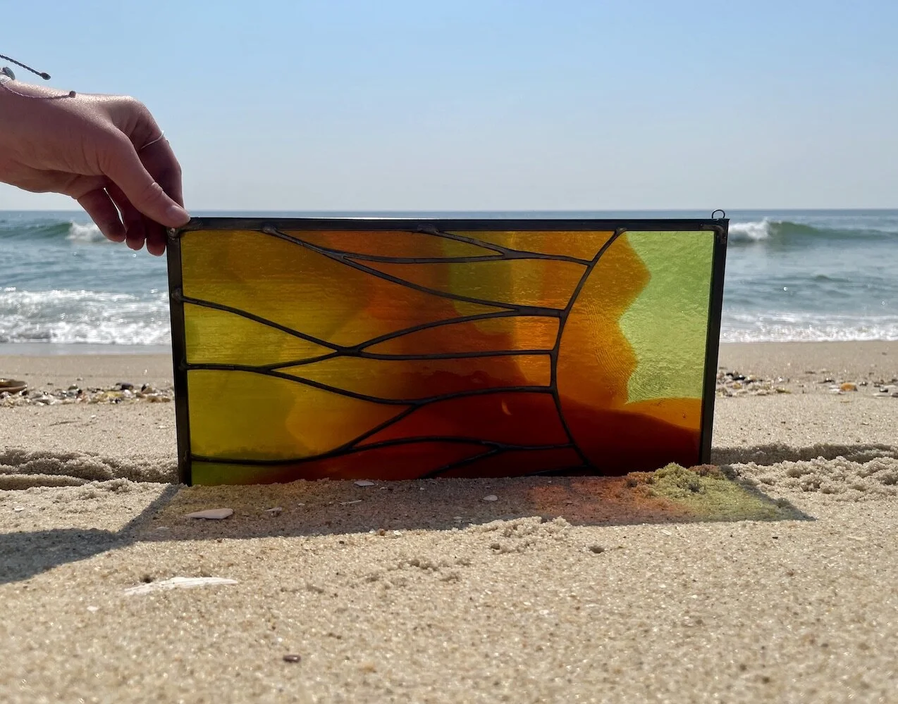 red and green sunset stained glass