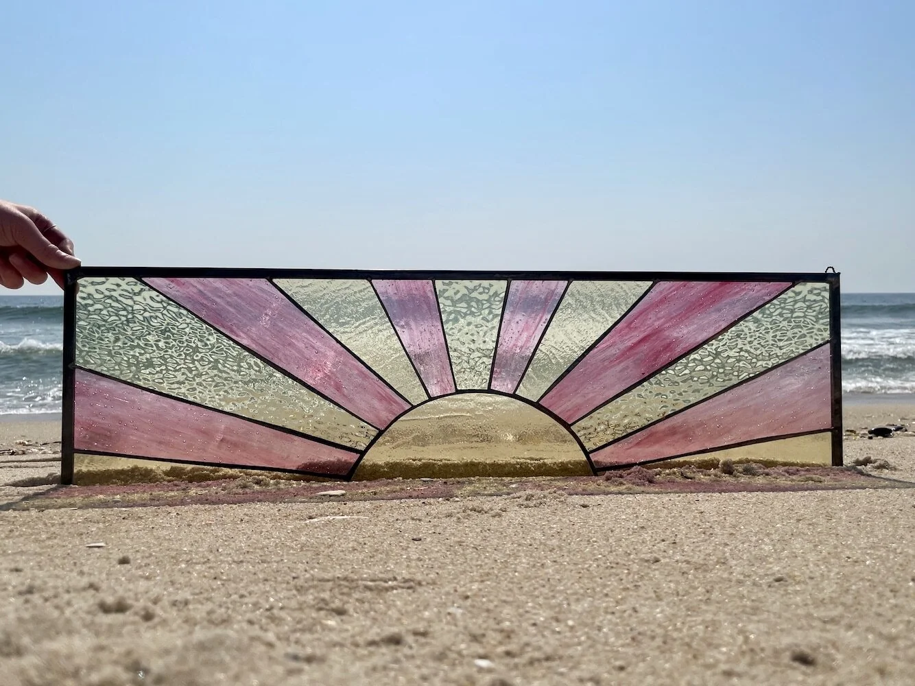 pink and yellow sunrise stained glass