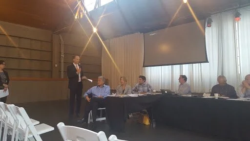 Director Scott Kubly giving an update on area transportation projects at last months Community Council gathering