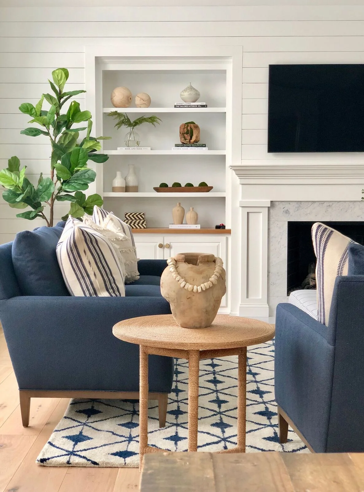 stephanie-kraus-designs-mainline-pa-family-room-project-after-styled-bookshelf.jpg