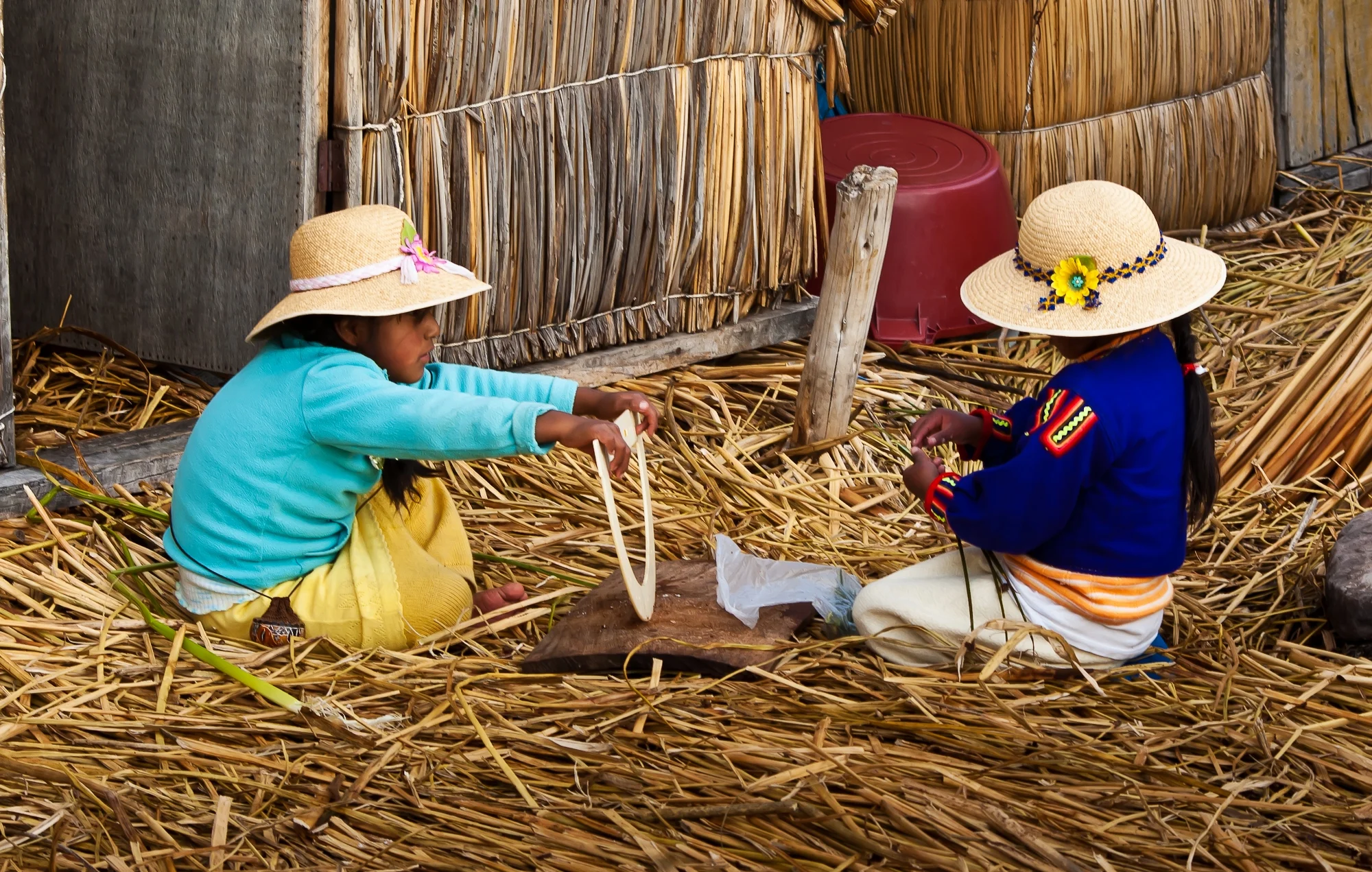 Children playing on Uros Island in Lake Titicaca