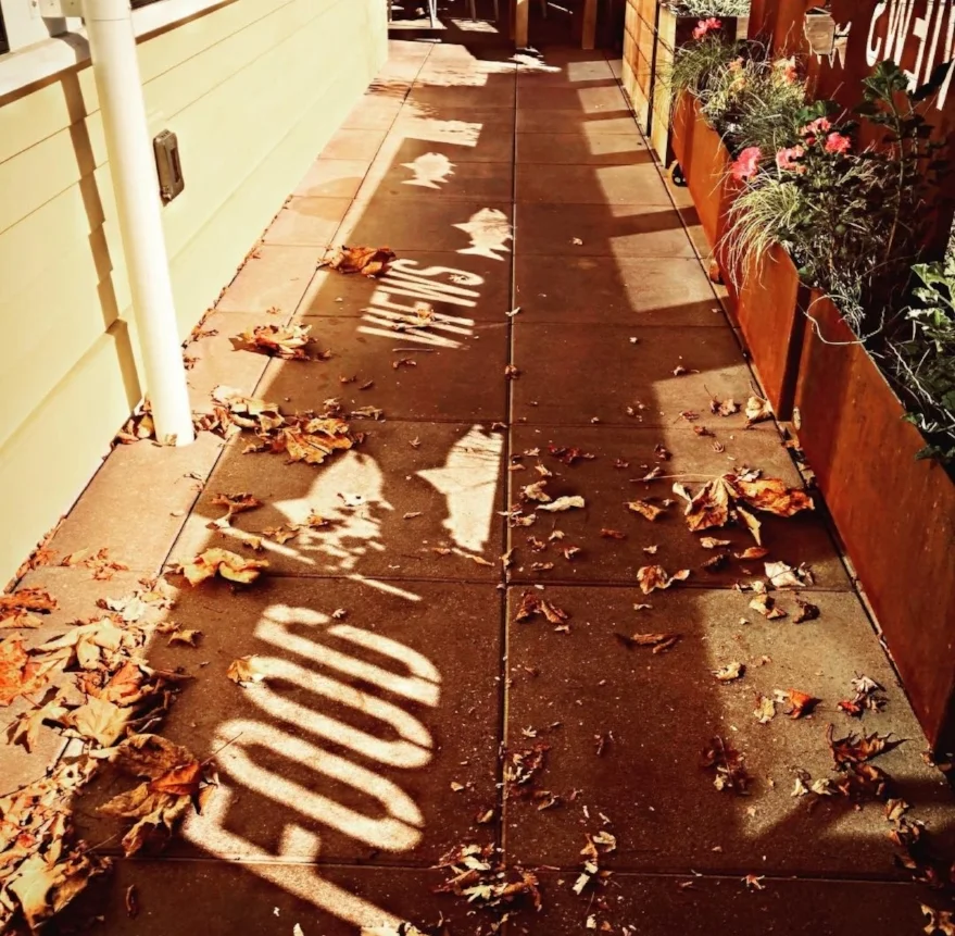 Shadows cast by our branded Corten planter boxes for Downrigger's Restaurant in Friday Harbor, WA 