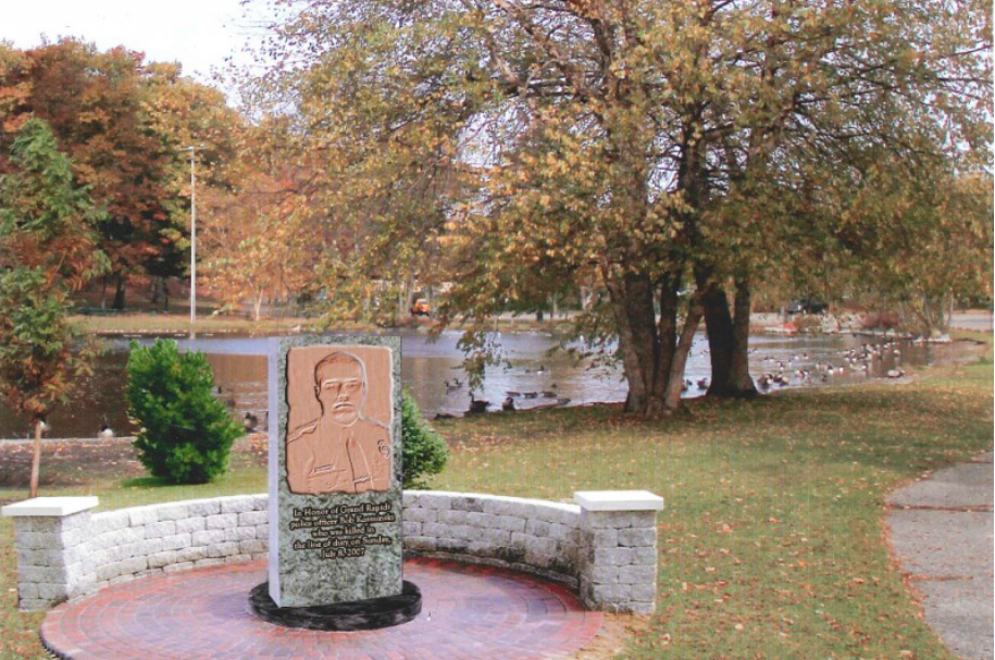 A rendering of what the memorial might look like in Richmond Park. The front will have Officer Bob Kozminski on it and the back will have the rest of the fallen Grand Rapids Police Officers on it.